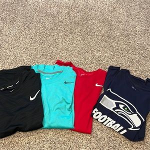 4 nike shirts all in like new condition.